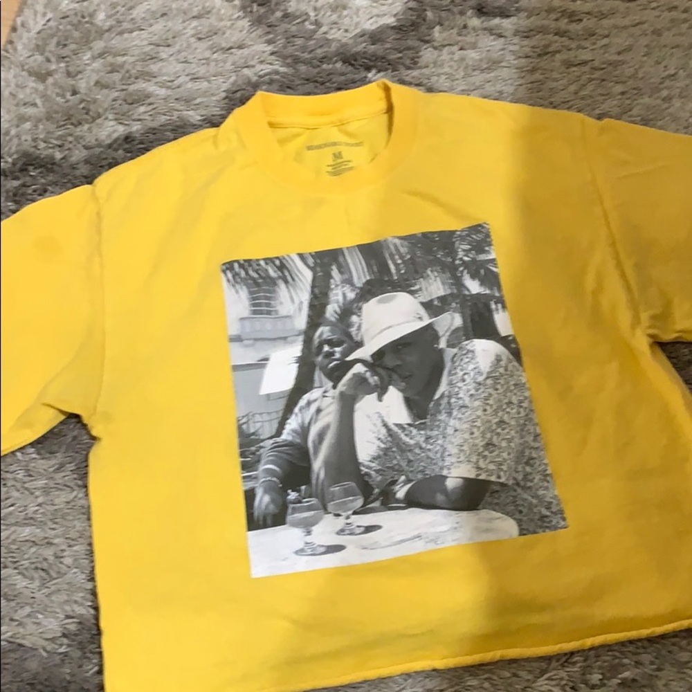 Yellow shirt with biggie smalls and jay z